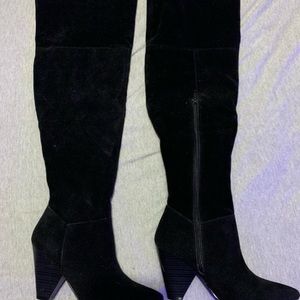 Black heeled over the knee boots